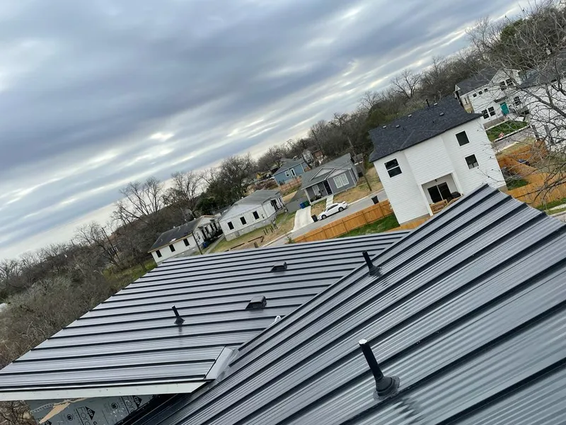 Standing seam metal roof panels with vents for Skylight Repair in Zuni Pueblo
